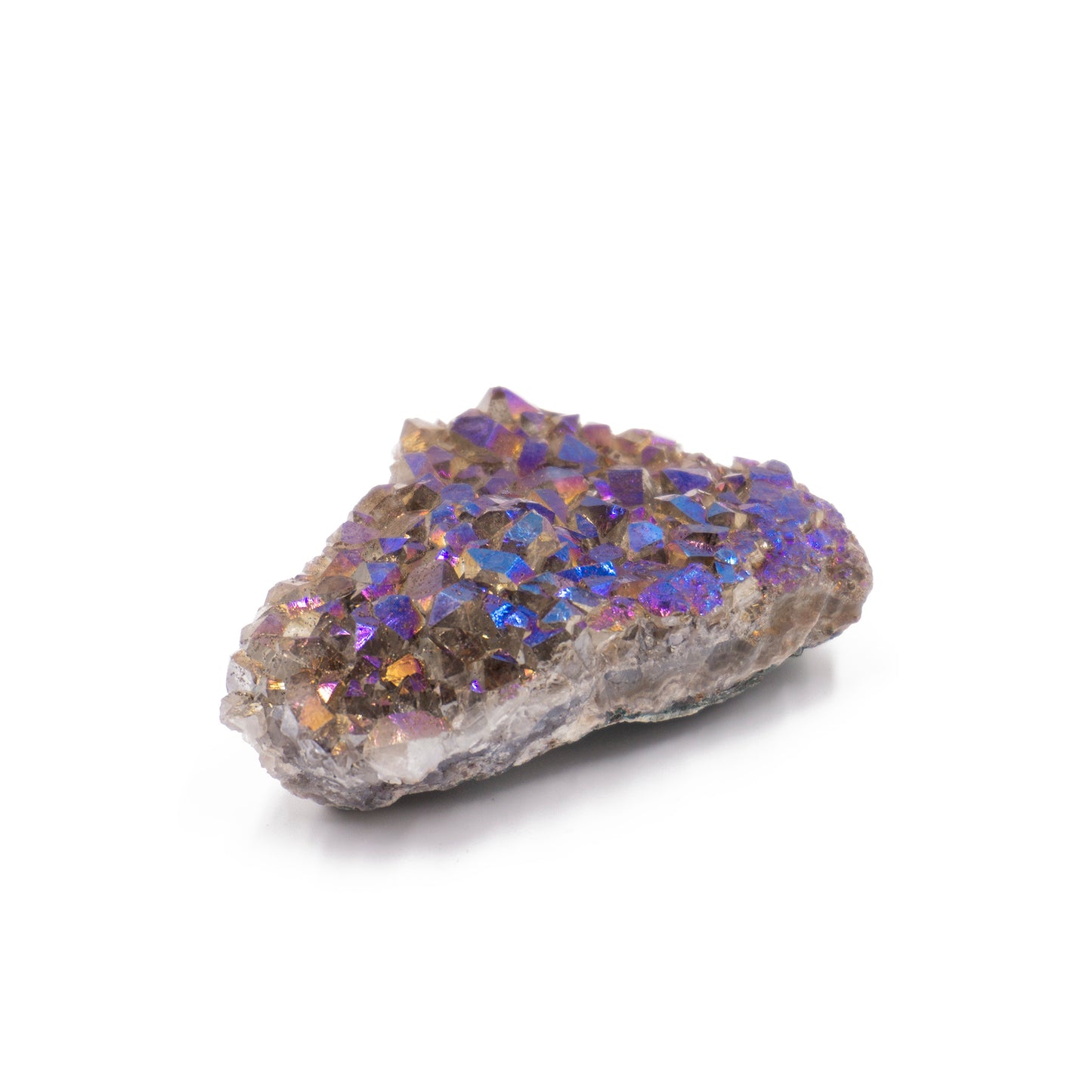 cluster of rainbow crystals growing on a gray stone