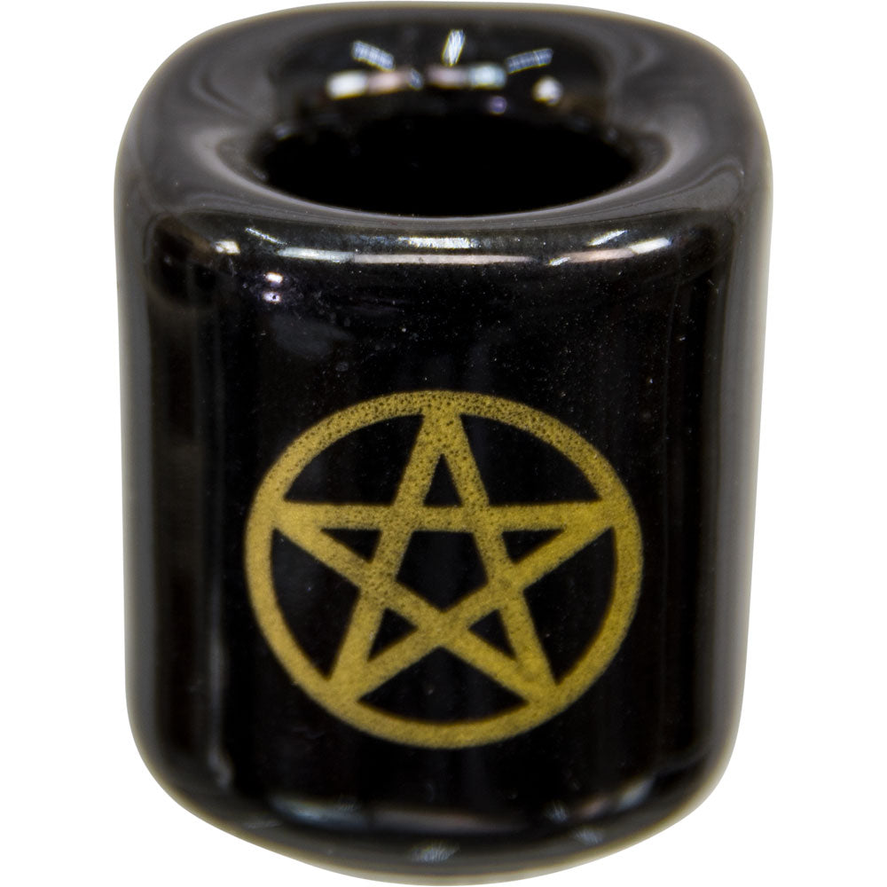 black porcelain candle holder with gold pentagram painted on it