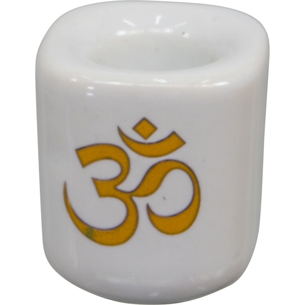 glossy white  porcelain candle holder with gold "ohm" symbol.