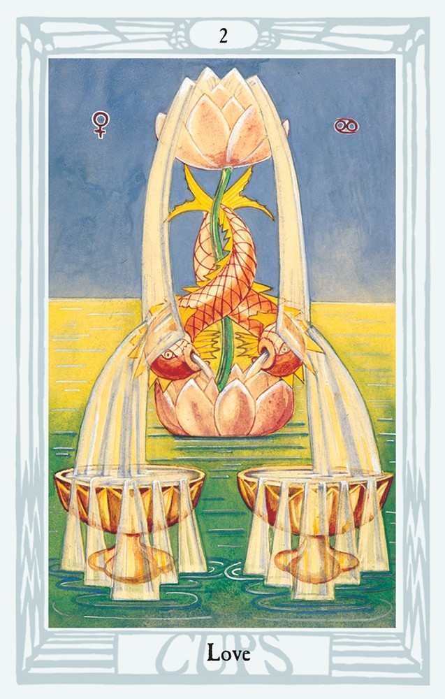 card labeled "love." image depicts a fountain made of koi fish and lotus flowers spewing water.