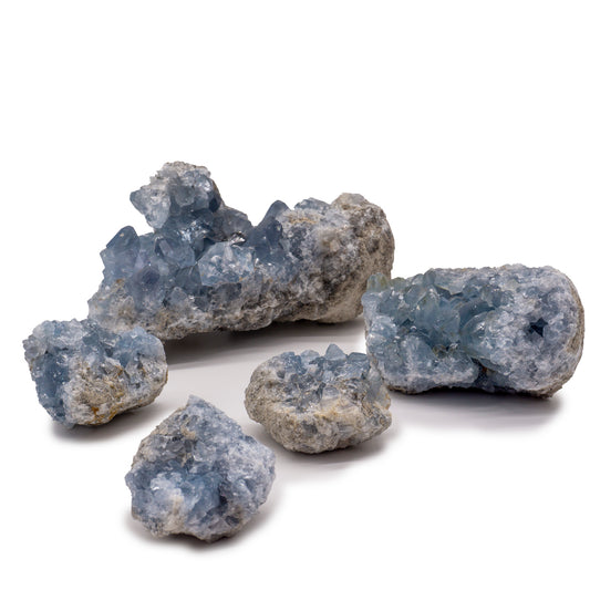 several uncut pieces of dull gray crystal