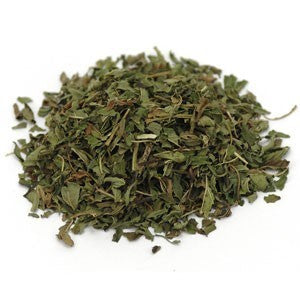 pile of dried and cut peppermint herbs