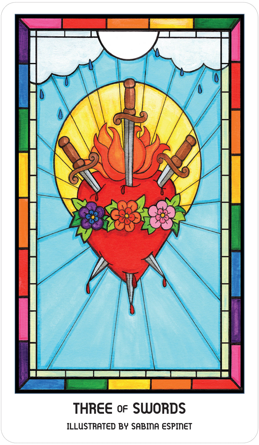 card labeled "three of swords." depicts a flaming heart with three swords driven through it.