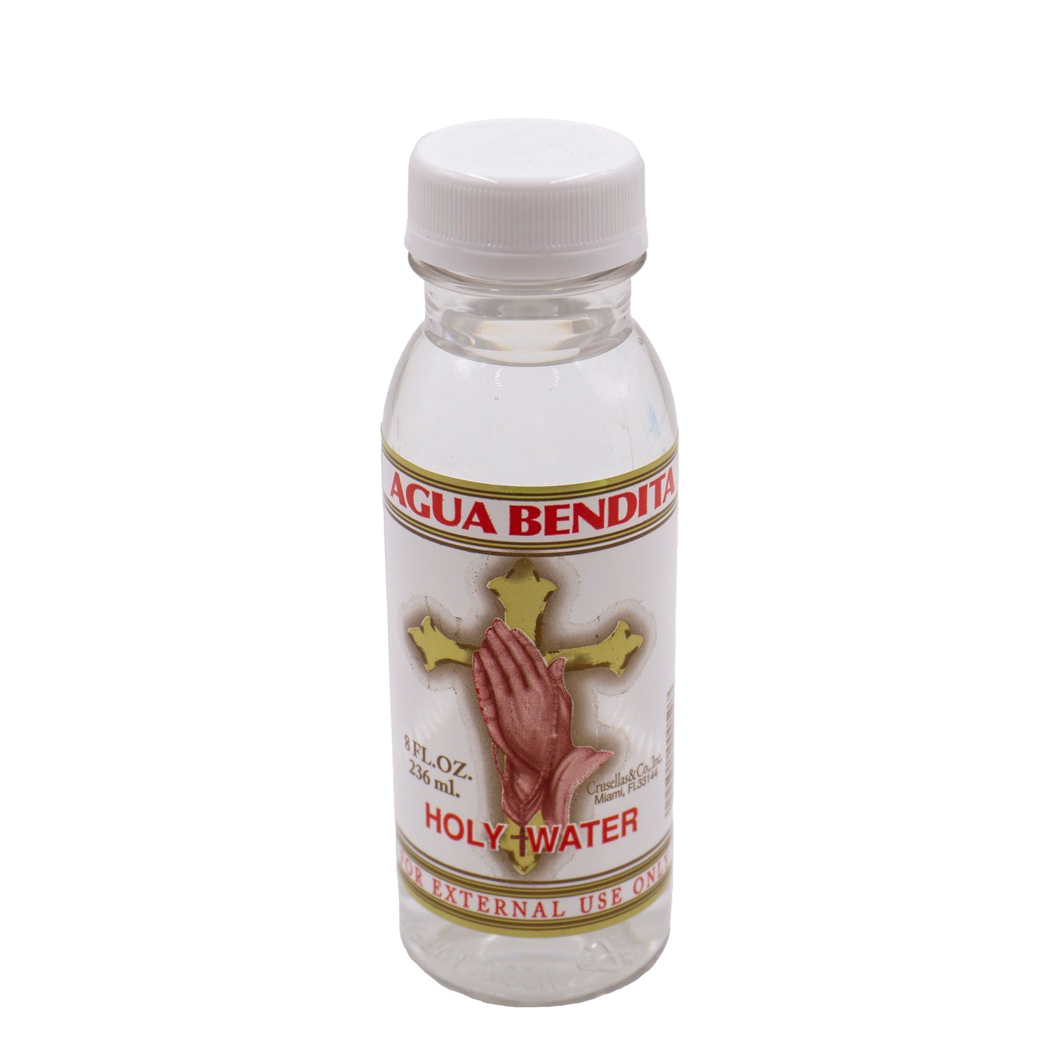 small plastic bottle labeled "agua bendita - holy water."